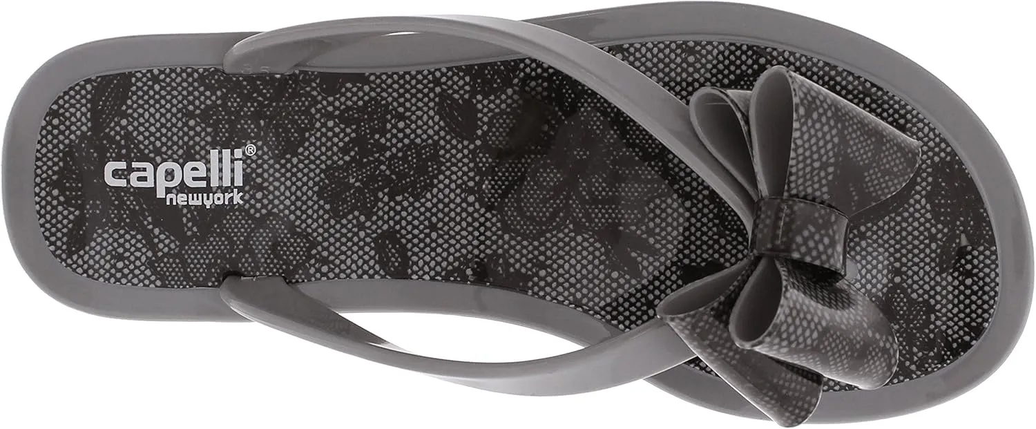 Capelli New York Ladies Floral Pom Opaque Jelly Flip Flops